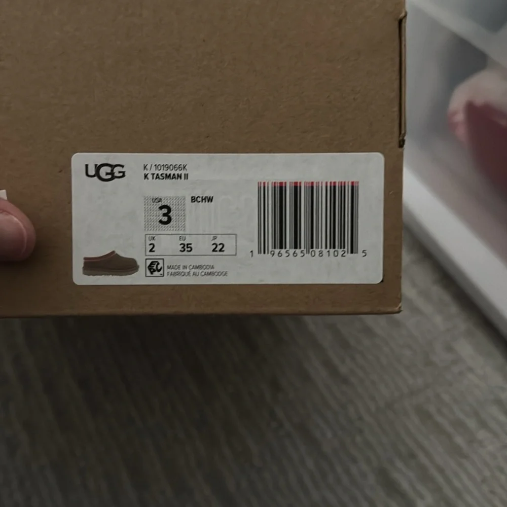 UGG Kids Slip-On Suede Slippers in Tan with Pink Trim